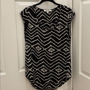 Black and white patterned blouse